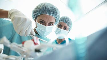 Surgeon working in the operating room