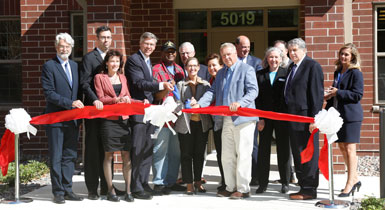 Group cutting ribbon for opening of a veteran apartment